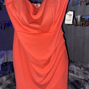 Mini dress with high slit on leg